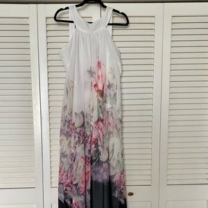 Size large pretty maxi dress. Never worn.